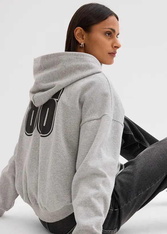 Felpa larga in puro cotone biologico con zip e cappuccio, bonprix