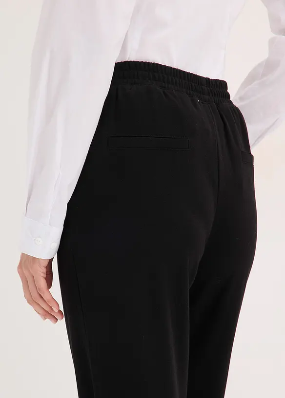 Pantaloni in jersey con elastico in vita e piega cucita, bonprix