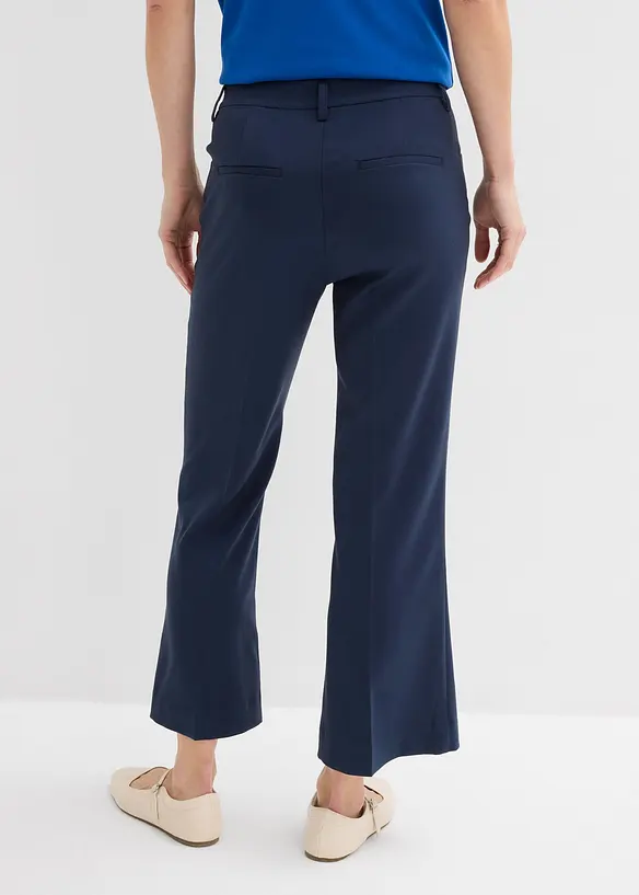 Pantaloni cropped svasati con bottone decorativo, bonprix