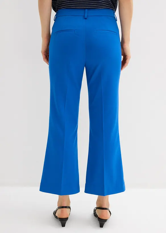 Pantaloni cropped svasati con bottone decorativo, bonprix