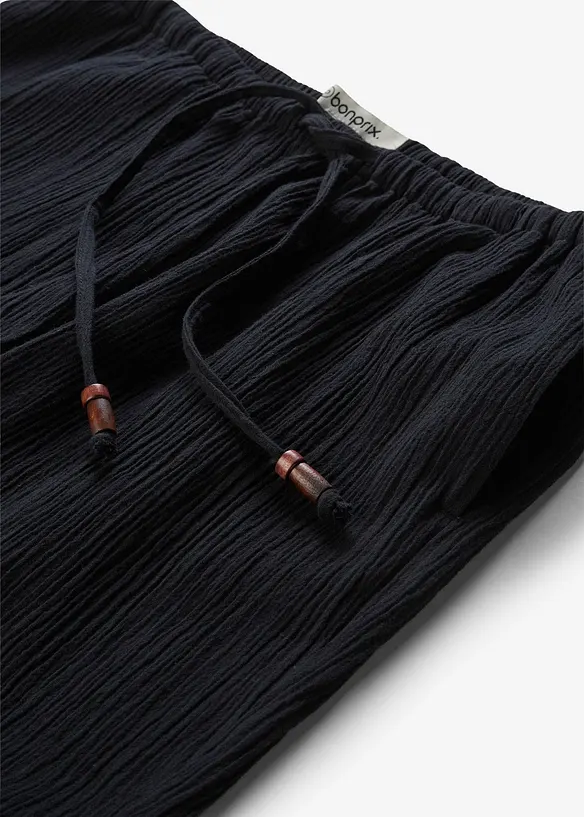 Pantaloni larghi con effetto operato, bonprix