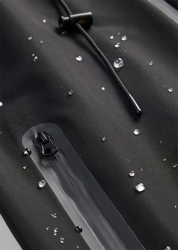 Giubbotto impermeabile leggero con borsa a tracolla, bonprix