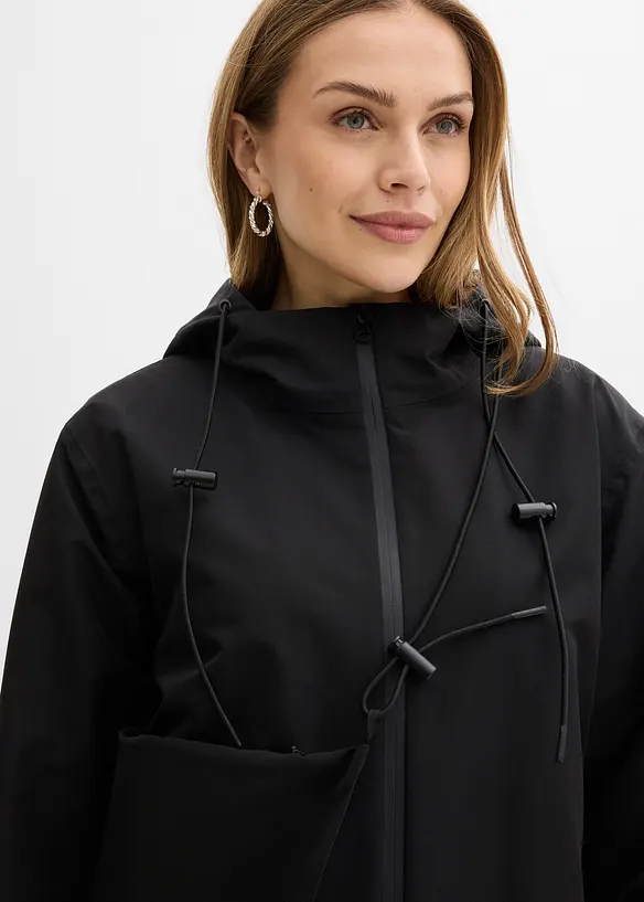 Giubbotto impermeabile leggero con borsa a tracolla, bonprix