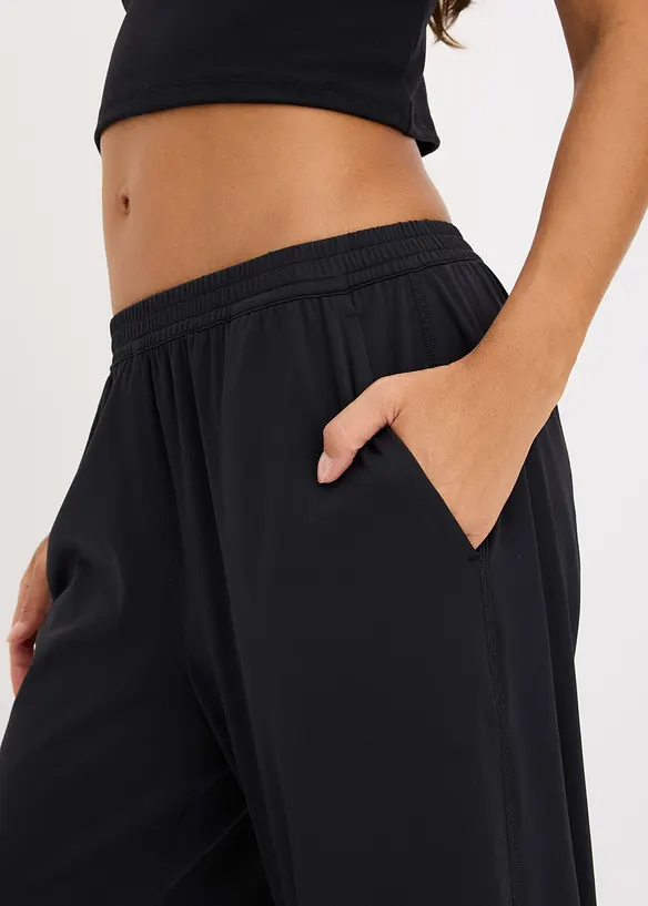 Pantaloni sportivi comodi con gambe larghe, ad asciugatura rapida, bonprix