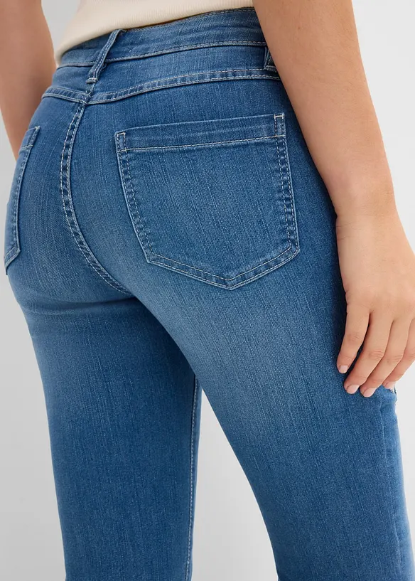 Jeans a zampa con ricami floreali, bonprix