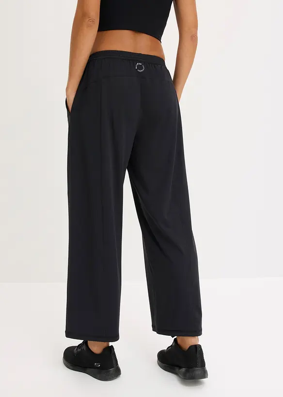 Pantaloni sportivi comodi con gambe larghe, ad asciugatura rapida, bonprix