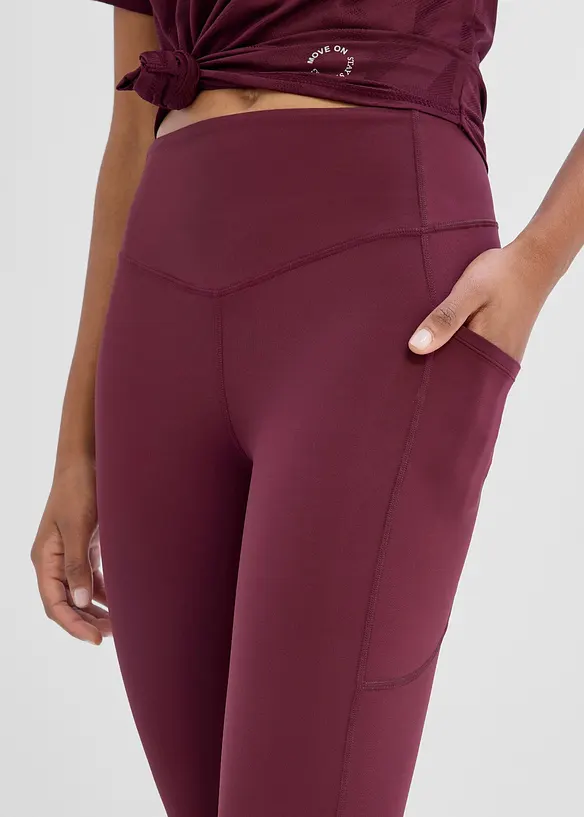 Leggings sportivi comodi e svasati con tasca per il cellulare, asciugatura rapida, bonprix