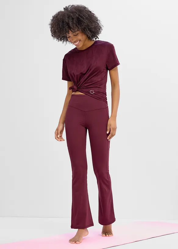 Leggings sportivi comodi e svasati con tasca per il cellulare, asciugatura rapida, bonprix