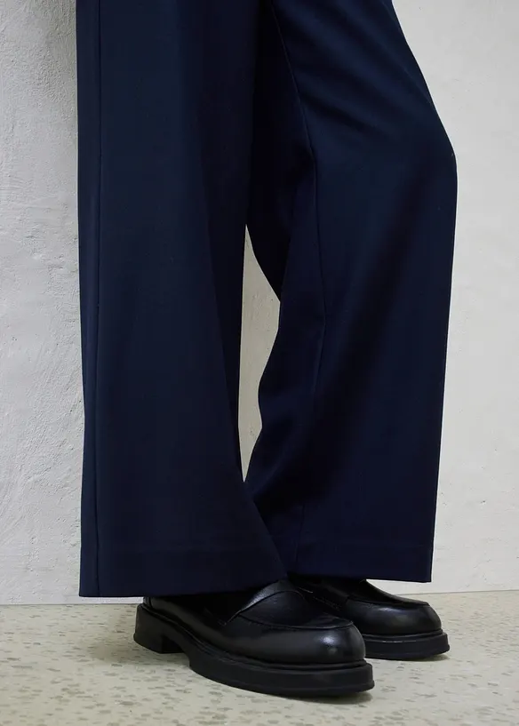 Pantaloni 5 tasche larghi con lana, bonprix