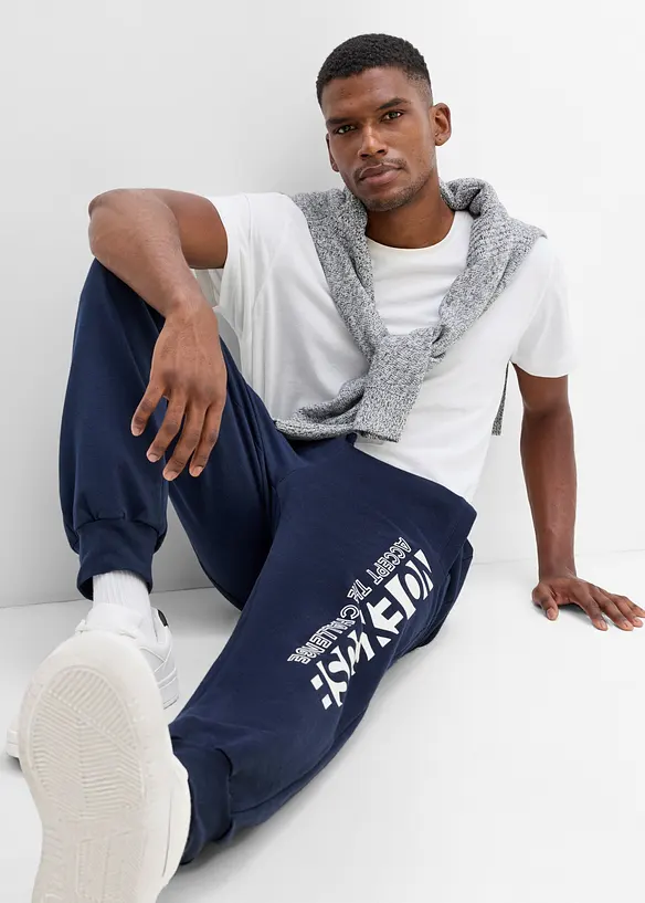 Pantaloni da jogging in puro cotone con stampa sportiva, bonprix