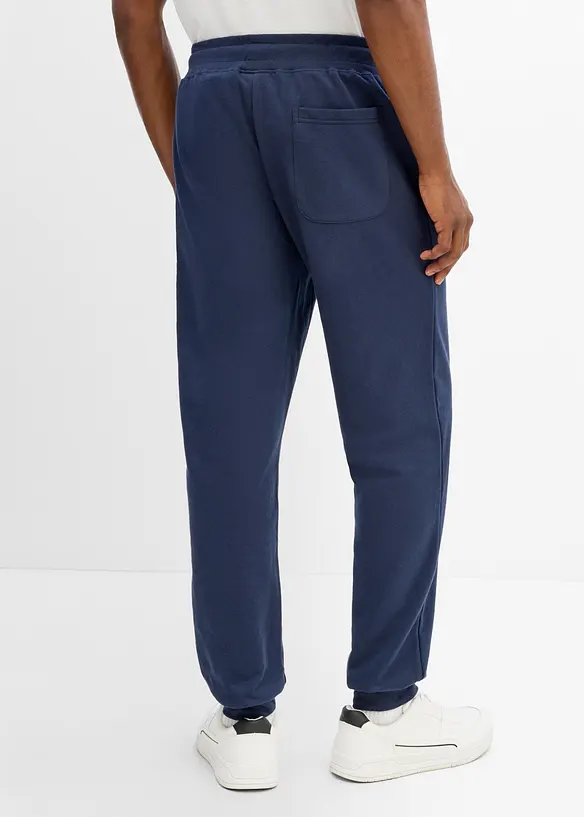 Pantaloni da jogging in puro cotone con stampa sportiva, bonprix