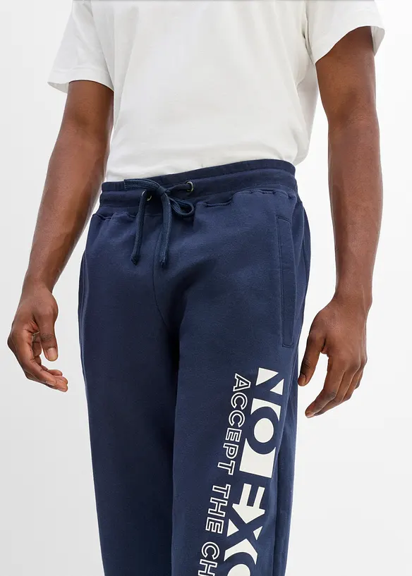 Pantaloni da jogging in puro cotone con stampa sportiva, bonprix