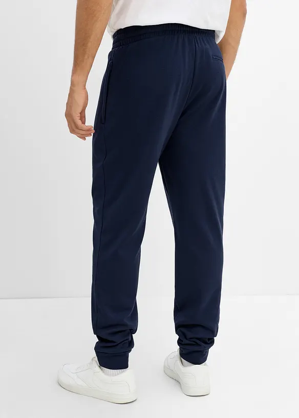 Pantaloni da jogging termici con tasche zippate, bonprix