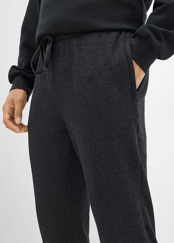 Pantaloni da jogging termici con tasche zippate, bonprix