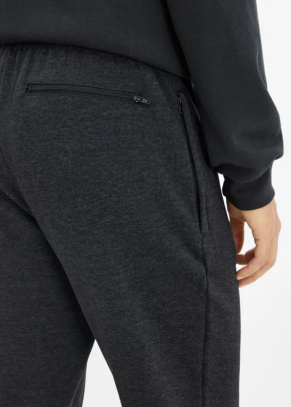 Pantaloni da jogging termici con tasche zippate, bonprix