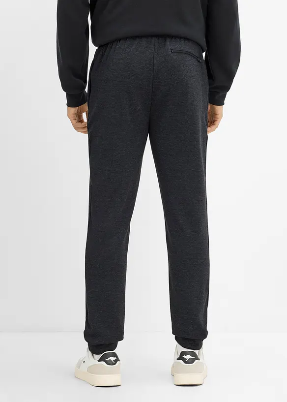 Pantaloni da jogging termici con tasche zippate, bonprix