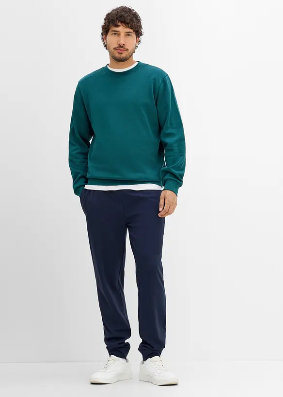 Pantaloni da jogging termici con tasche zippate, bonprix