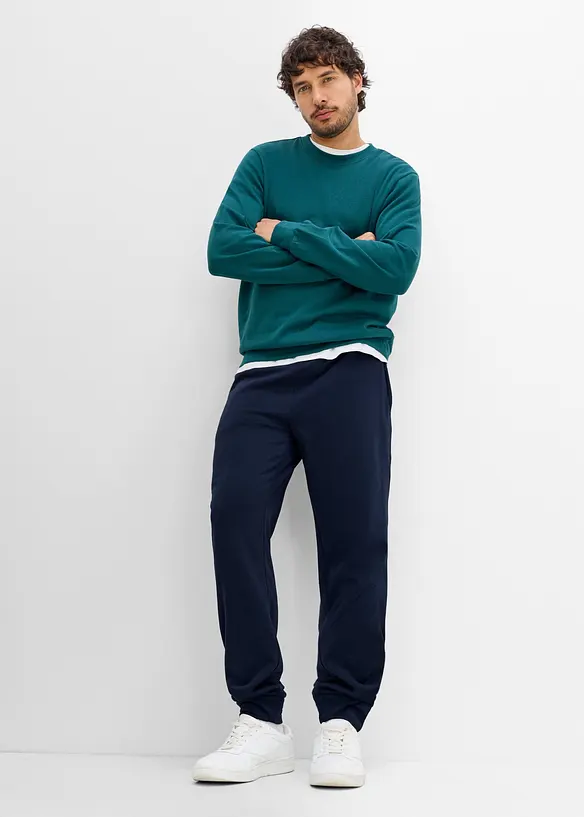 Pantaloni da jogging termici con tasche zippate, bonprix