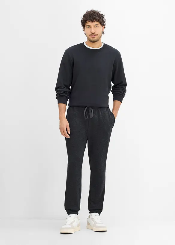 Pantaloni da jogging termici con tasche zippate, bonprix
