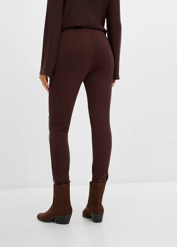 Leggings in similpelle con impunture al ginocchio, bonprix