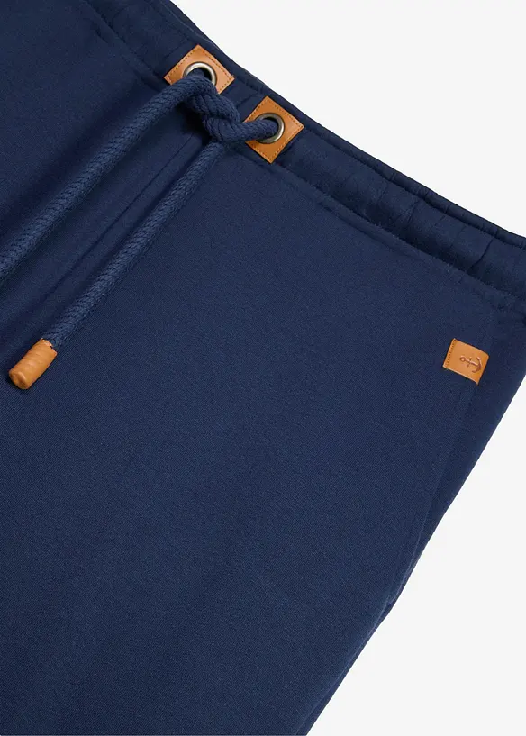 Pantaloni da jogging pesanti con dettagli in PU, bonprix