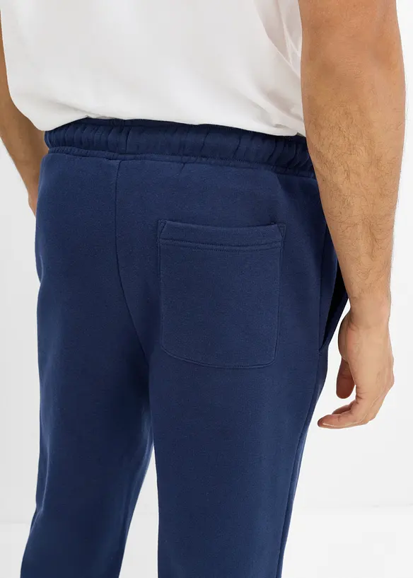 Pantaloni da jogging pesanti con dettagli in PU, bonprix