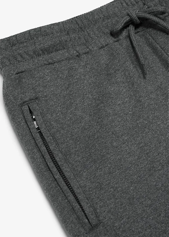 Pantaloni da jogging con tasche zippate, bonprix