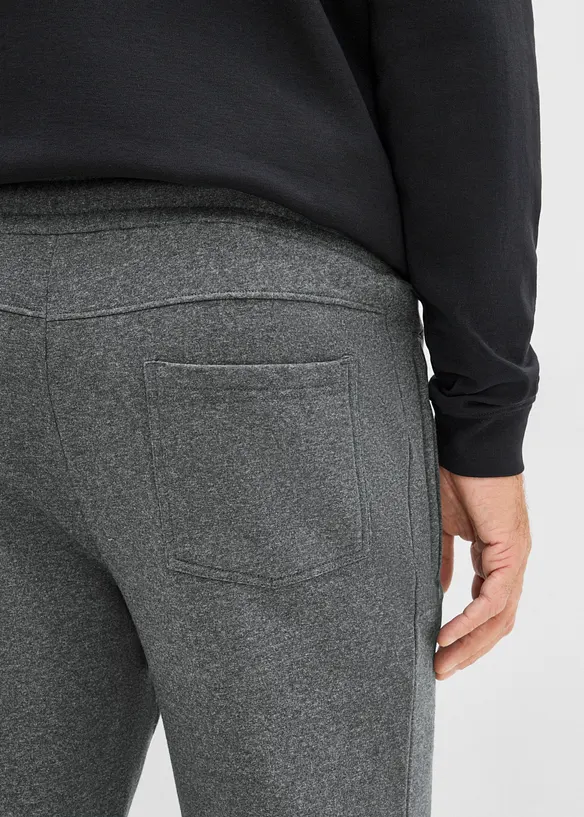 Pantaloni da jogging con tasche zippate, bonprix