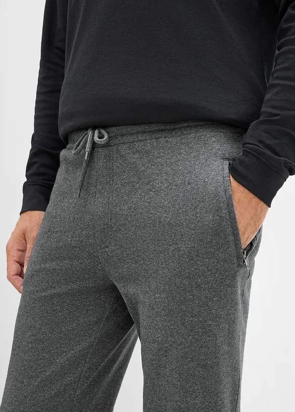 Pantaloni da jogging con tasche zippate, bonprix