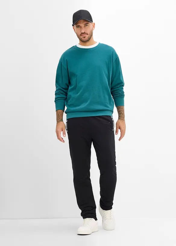 Pantaloni da jogging termici con pile soffice, bonprix